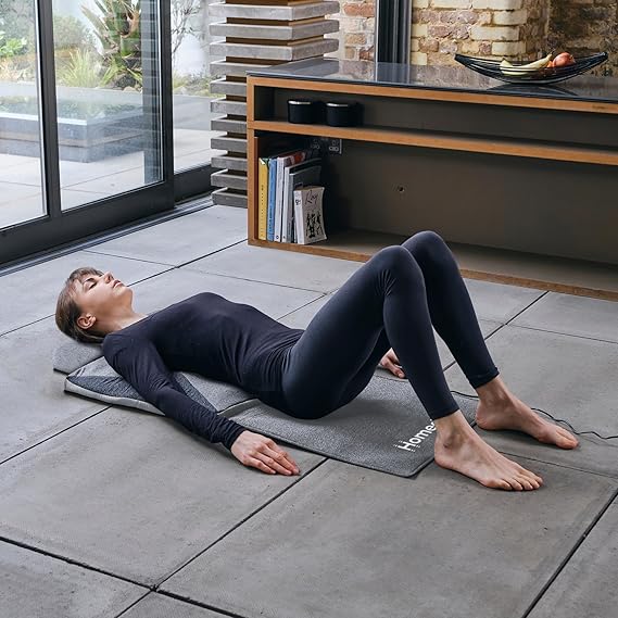 “Daily stretching made effortless.” Folding massage mat for full body stretching