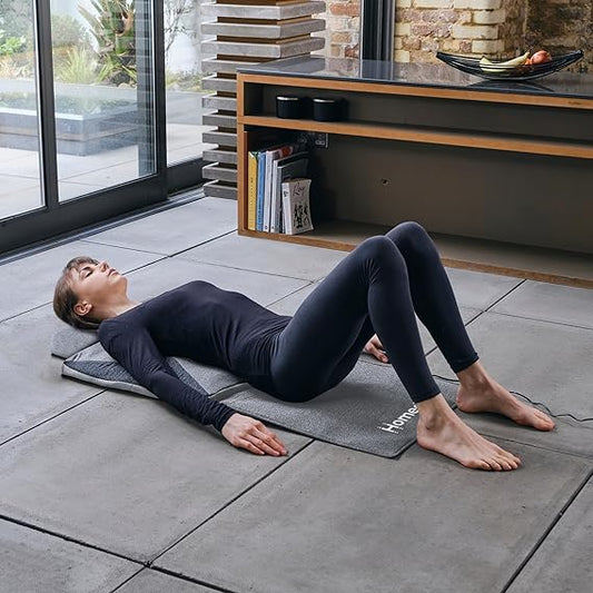 “Daily stretching made effortless.” Folding massage mat for full body stretching